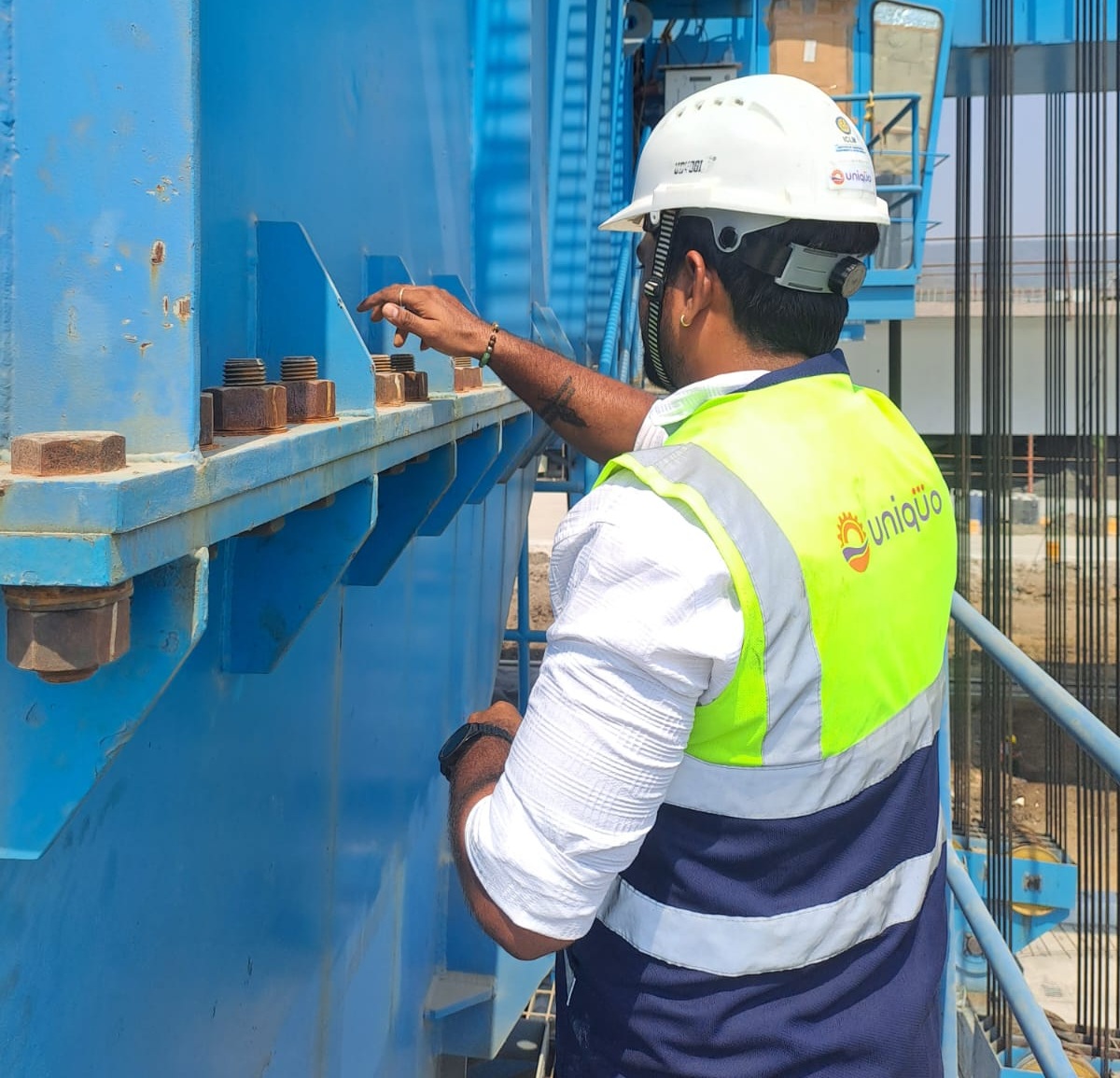 UNIQUO inspection engineer reviewing industrial site conditions